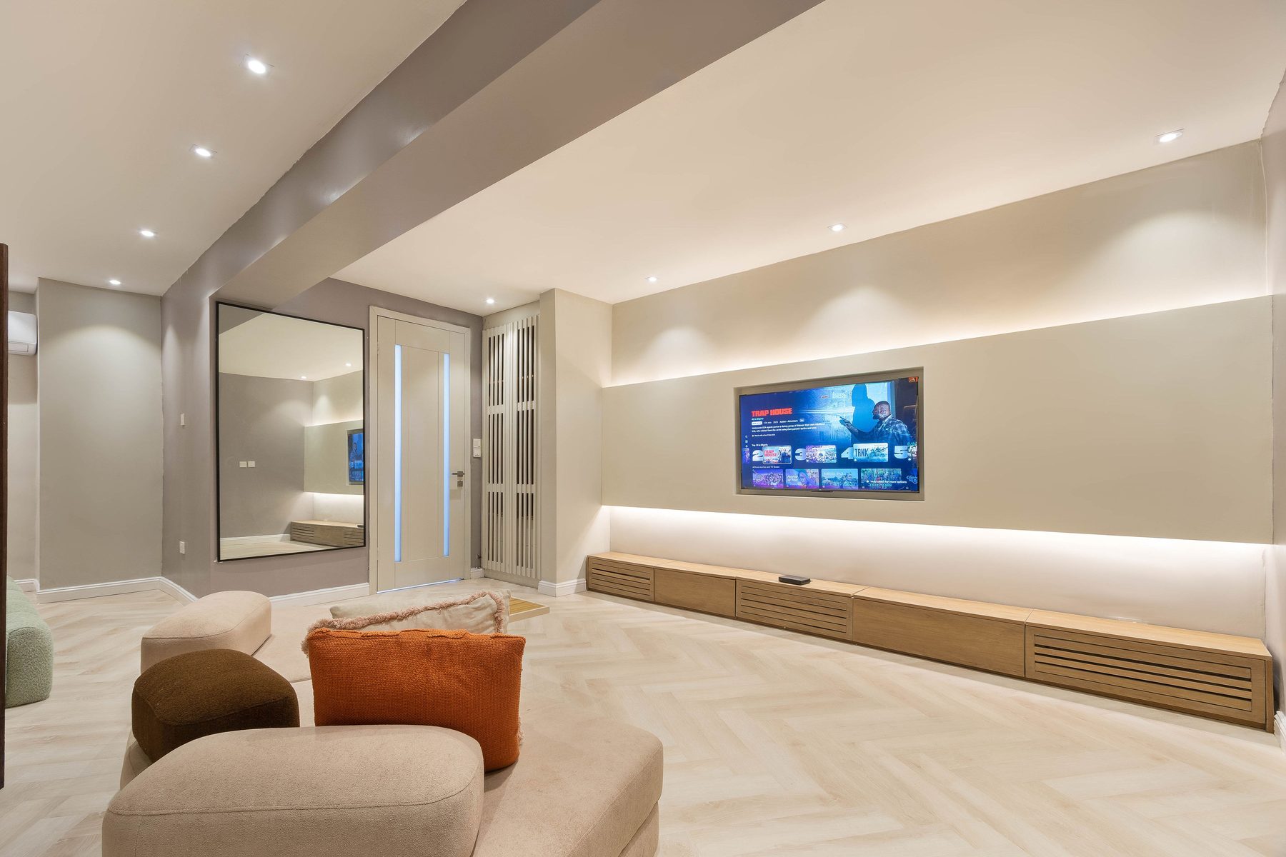 Media lounge at The District Lekki with herringbone floors