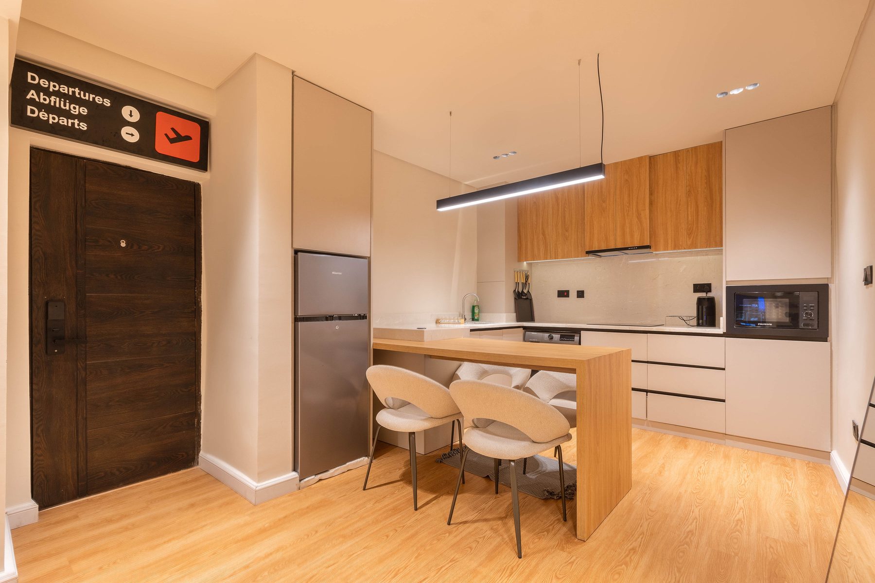 Kitchen at The District Lekki with the signature Departures sign